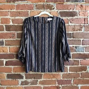 Navy print blouse with tie sleeves